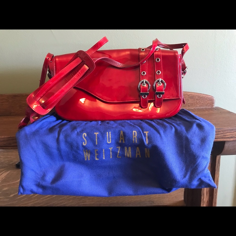 Stuart Weitzman Red Patent Leather Handbag. 10 5/8”L x 6”H x 2 1/2”D. Adjustable